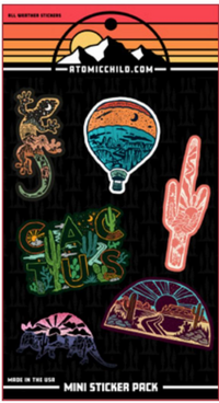 Southwest mini sticker pack, a sheet of six stickers including a gecko, a hot air balloon over a canyon, a saguaro cactus, cactus lettering, an armadillo and a desert road scene.
