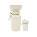 Springer 20 oz Dog Travel Water Bottle in Oat, a cream flip bottle with a collapsible silicone bowl