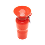 Springer 22 oz Classic Travel Bottle in Poppy, a red-orange portable dog water bottle with a fold-out bowl
