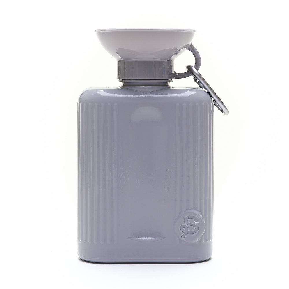 Springer Growler 44 oz Dog Travel Water Bottle in Grey, a ribbed bottle with a wide bowl top and carabiner