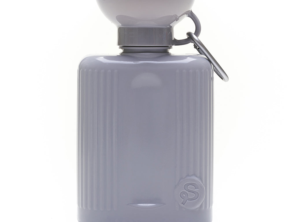 Springer Growler 44 oz Dog Travel Water Bottle in Grey, a ribbed bottle with a wide bowl top and carabiner