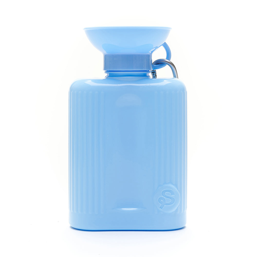 Springer Growler 44 oz Dog Travel Water Bottle in Sky Blue, a ribbed bottle with a wide bowl top and carabiner
