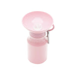 Springer Mini Travel Bottle in Cotton Candy, a light pink 15 oz dog water bottle with a fold-out bowl
