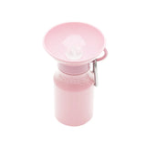 Springer Mini Travel Bottle in Cotton Candy, a light pink 15 oz dog water bottle with a fold-out bowl