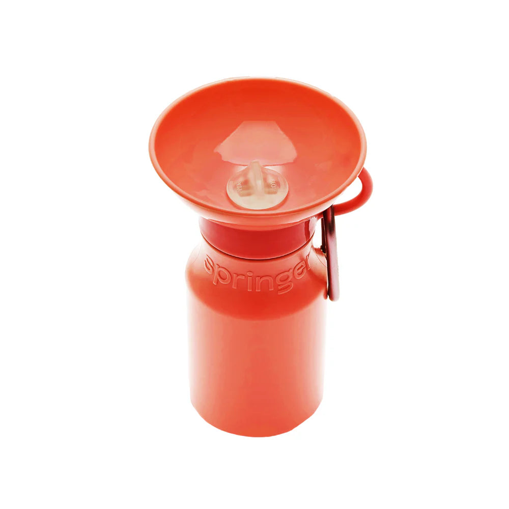 Springer Mini Travel Bottle in Poppy, a red-orange 15 oz dog water bottle with a fold-out bowl