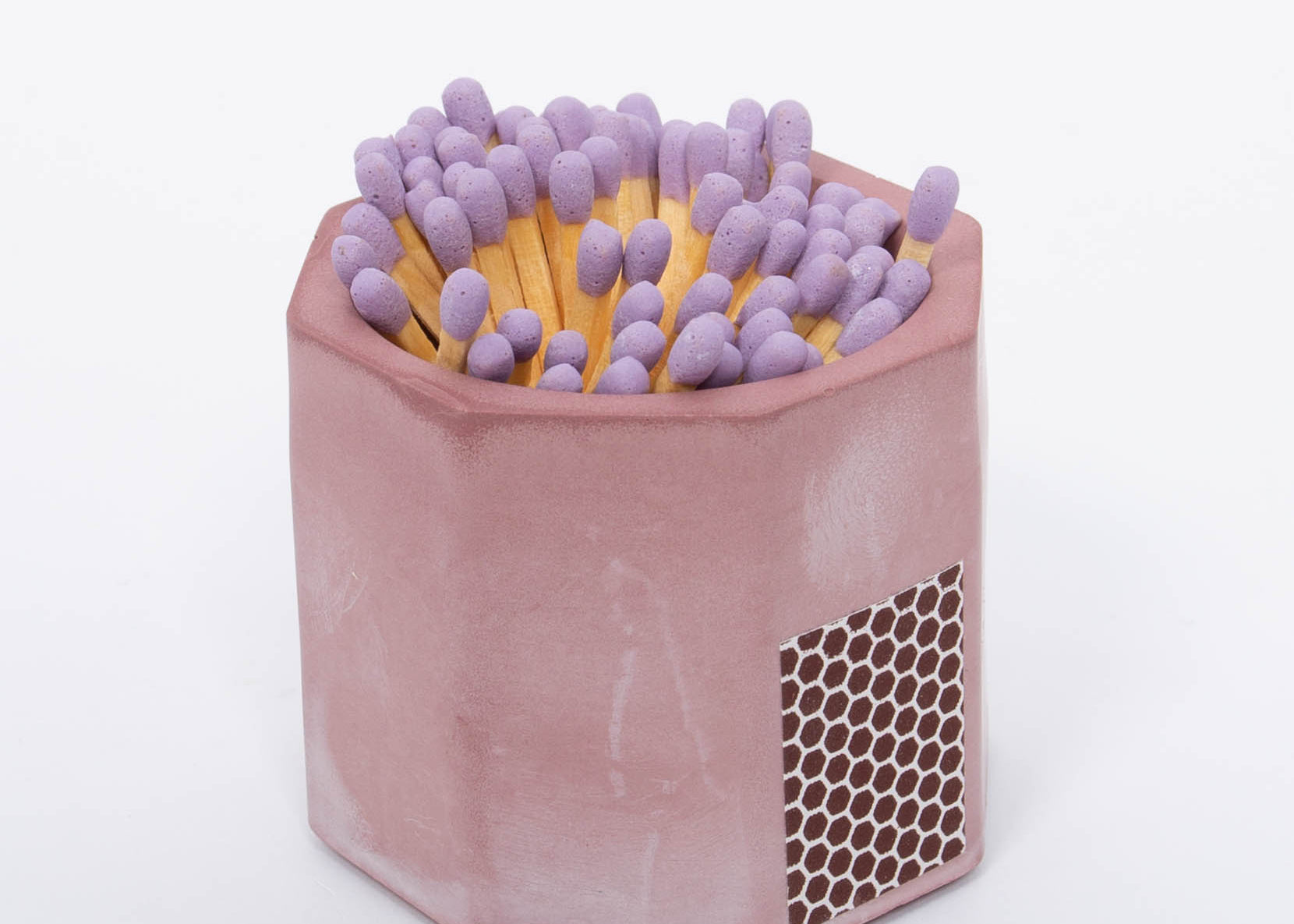 Tenn Prairie Concrete Match Holder in Acai purple with purple-tipped matches and a side striker