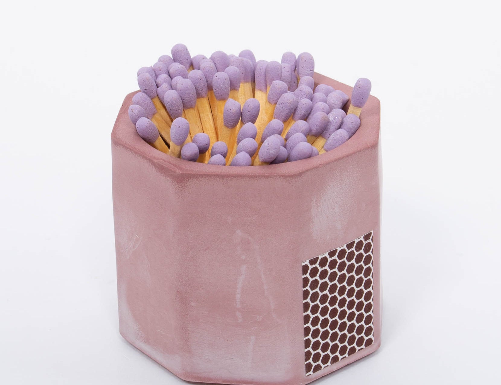 Tenn Prairie Concrete Match Holder in Acai purple with purple-tipped matches and a side striker