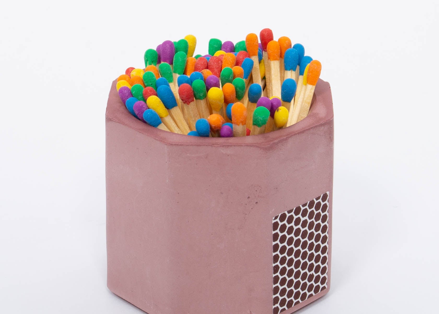Tenn Prairie Concrete Match Holder in Purple with rainbow-tipped matches and a side striker