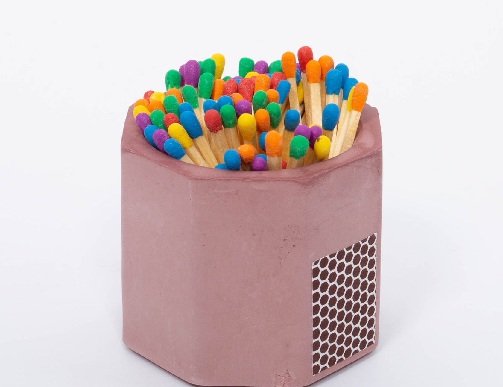 Tenn Prairie Concrete Match Holder in Purple with rainbow-tipped matches and a side striker