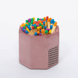 Tenn Prairie Concrete Match Holder in Purple with rainbow-tipped matches and a side striker