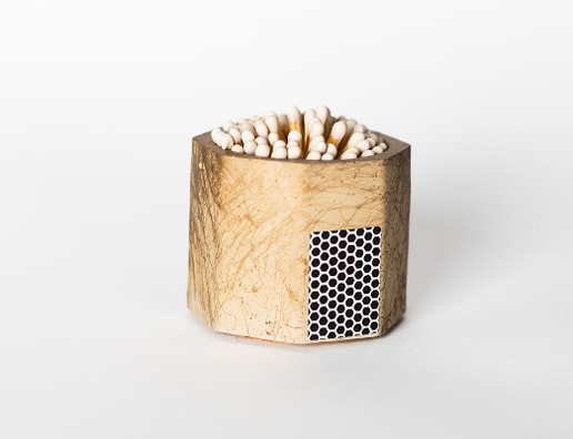 Tenn Prairie Concrete Match Holder in Taupe & Gold with white-tipped matches and a side striker