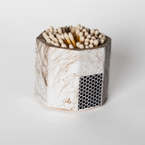 Tenn Prairie Concrete Match Holder in White & Gold with white-tipped matches and a side striker