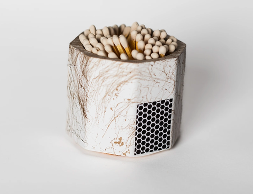 Tenn Prairie Concrete Match Holder in White & Gold with white-tipped matches and a side striker