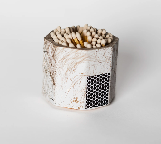 Tenn Prairie Concrete Match Holder in White & Gold with white-tipped matches and a side striker