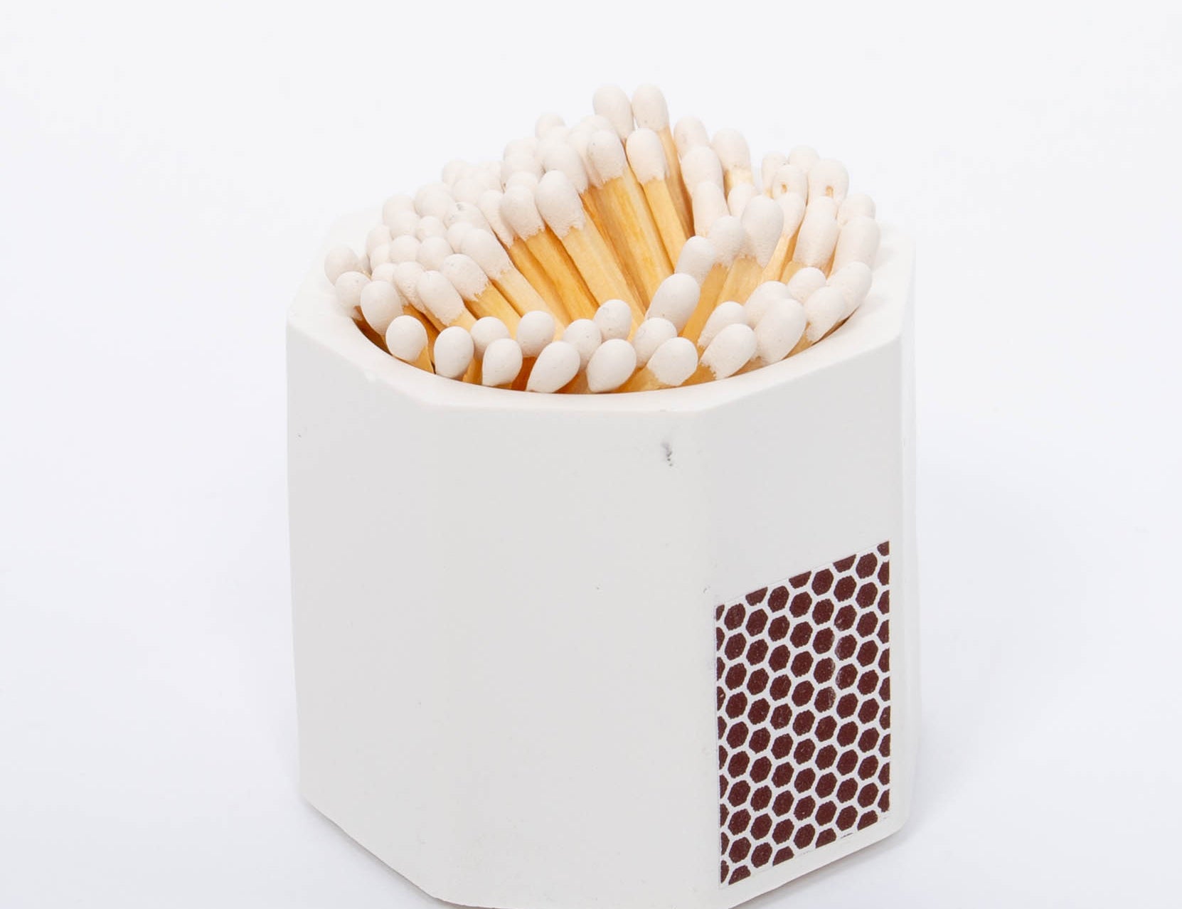 Tenn Prairie Concrete Match Holder in White with White matches and a striker patch on the side