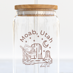 The Care Co Moab Desert Glass Can with a bamboo lid and glass straw, printed with a cowboy hat and desert buttes