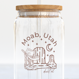 The Care Co Moab Desert Glass Can with a bamboo lid and glass straw, printed with a cowboy hat and desert buttes