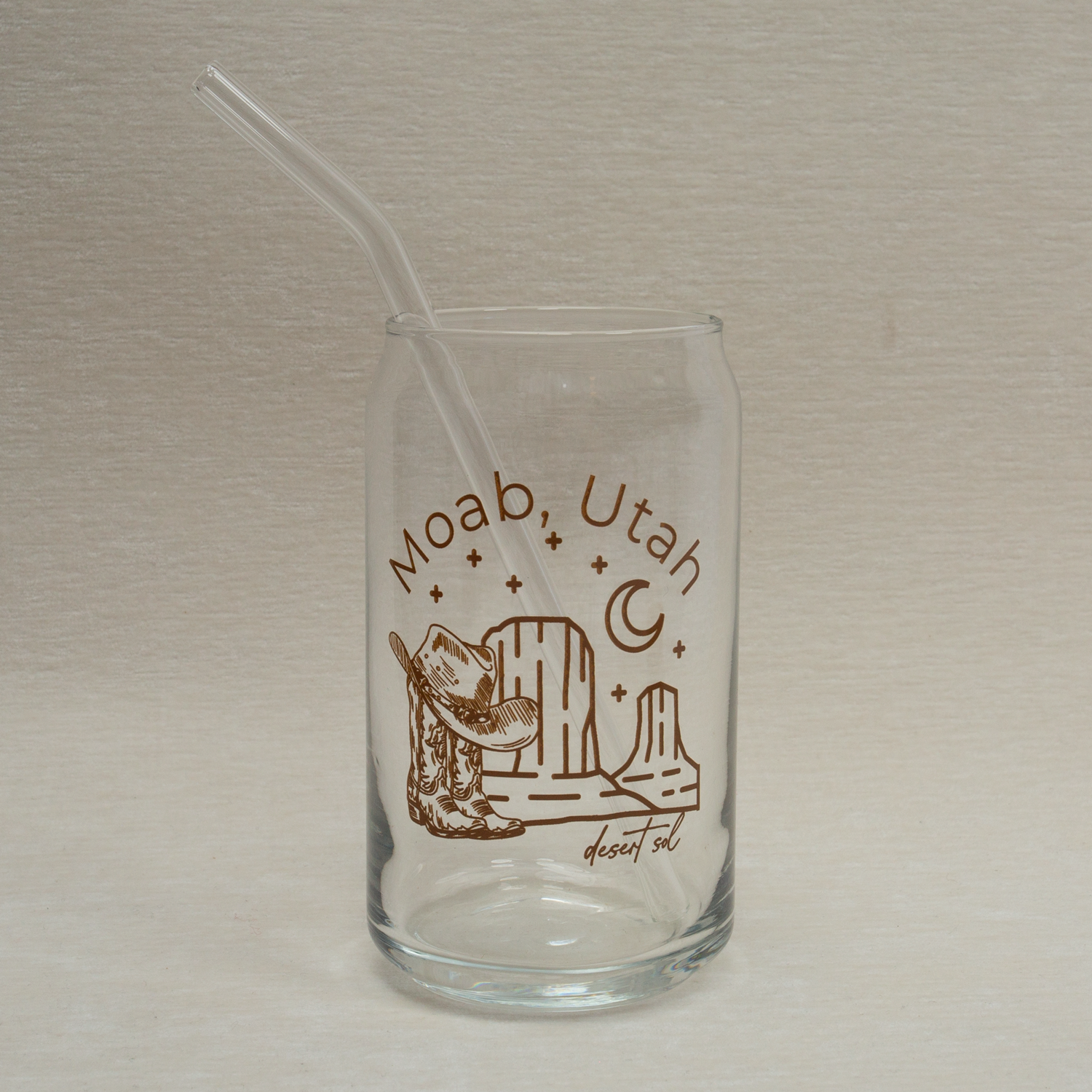 The Care Co Moab Desert Glass Can with a glass straw and no lid