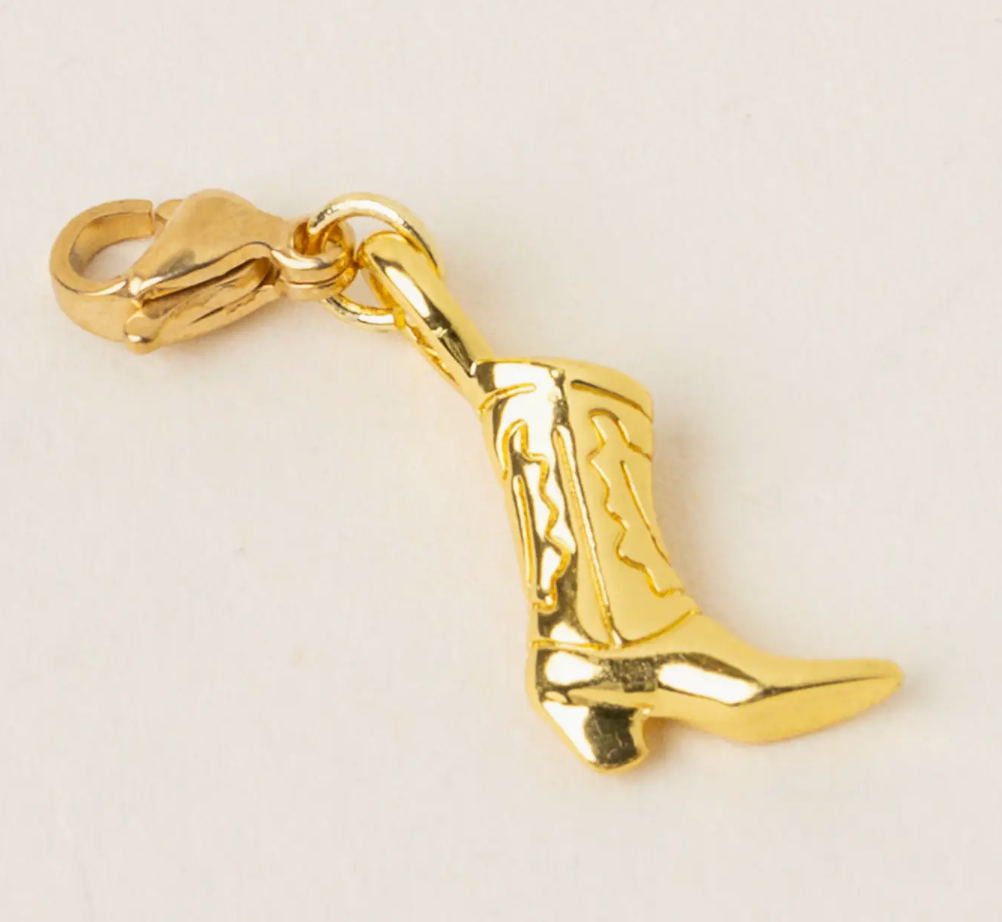 The Darling Effect Jewelry Charm, a gold cowboy boot charm on a lobster clasp