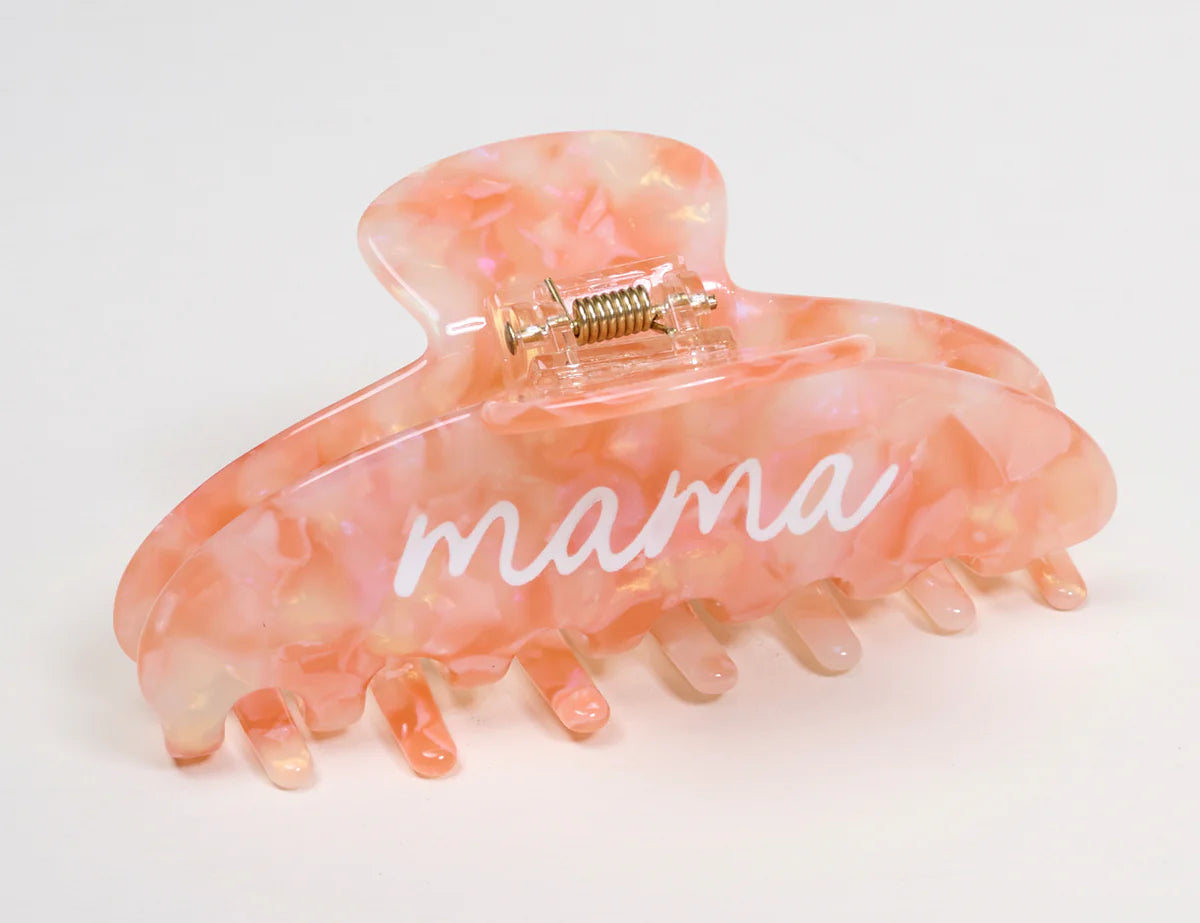 The Darling Effect Claw Clip in peach marbled acrylic printed with the word mama