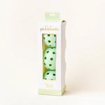 The Darling Effect Pickleball Ball Set in Green, a box of three mint green pickleballs
