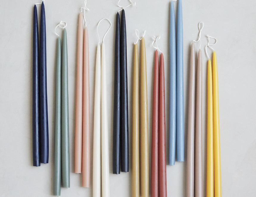 The Floral Society 12-inch Taper Candles, pairs of hand-dipped tapers in navy, sage, cream, terracotta, blush, mustard and grey hanging by their wicks
