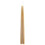 The Floral Society 18-inch Dipped Taper Candles in Miel, a pair of honey-gold tapers hanging by their wick on white