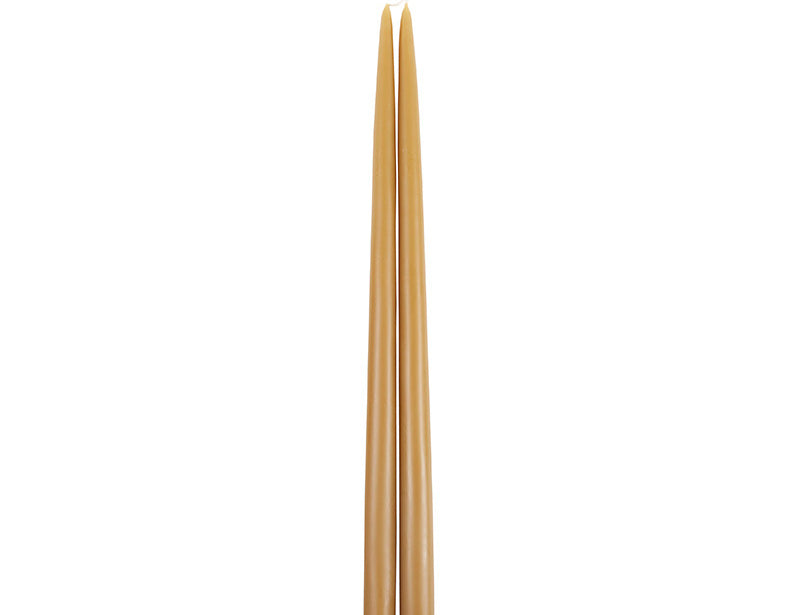 The Floral Society 18-inch Dipped Taper Candles in Miel, a pair of honey-gold tapers hanging by their wick on white