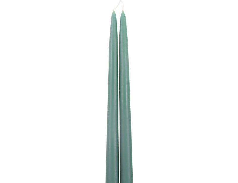The Floral Society 18-inch Dipped Taper Candles in Moss green, a pair of sage-green tapers hanging by their wick on white