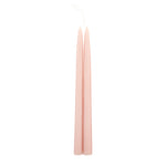 The Floral Society 18-inch Dipped Taper Candles in Petal, a pair of soft blush pink tapers hanging by their wick on white