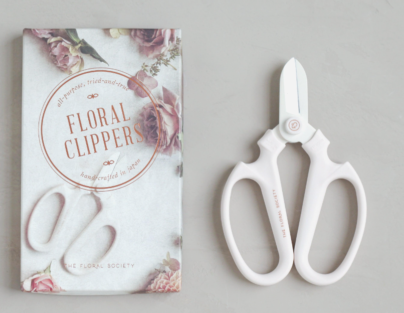 The Floral Society Japanese Floral Clippers, white-handled clippers beside their floral gift box