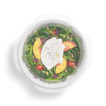 W&P Reusable Stretch Lid covering a bowl of salad with poached egg, from above