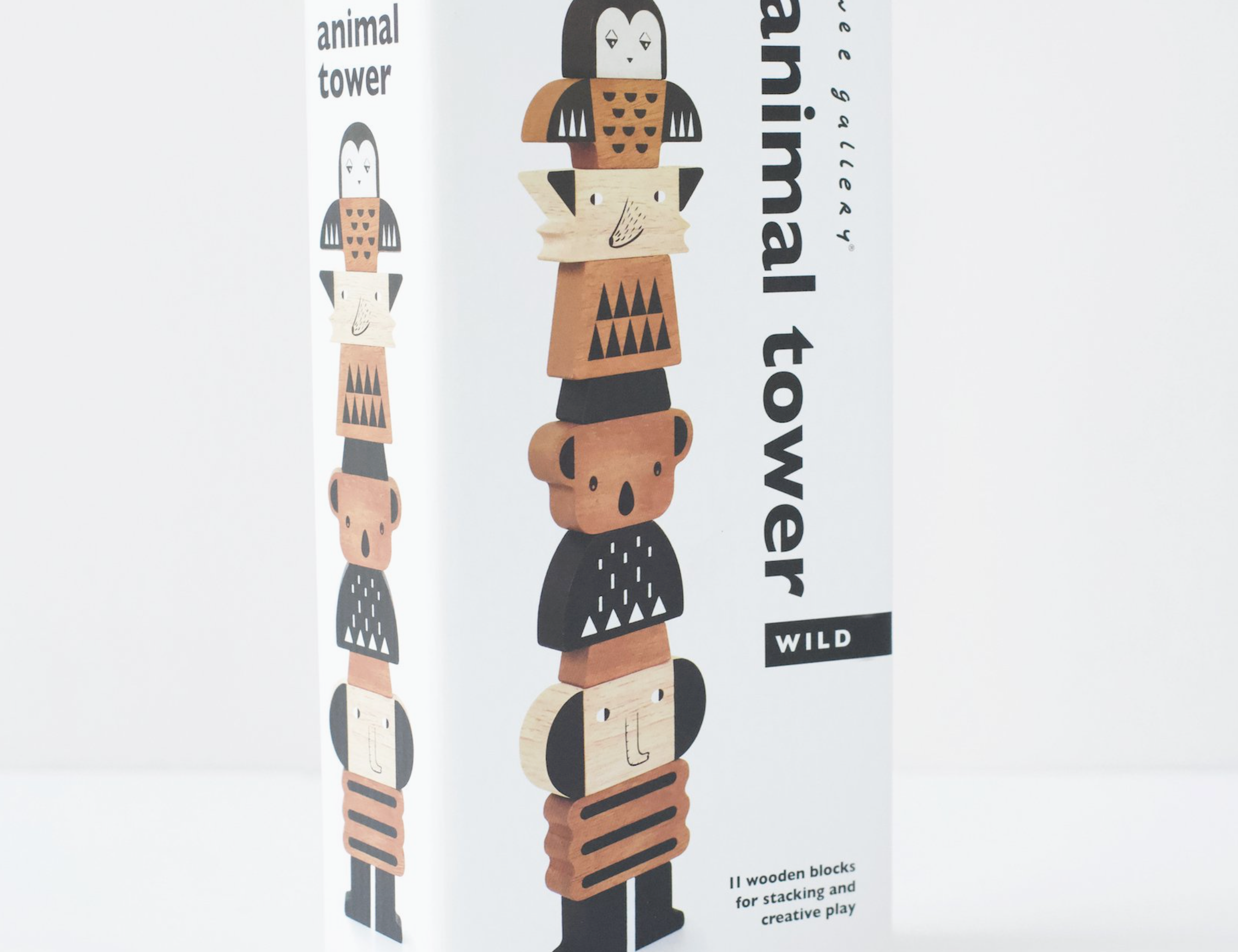 Wee Gallery Animal Tower Wild, boxed wooden stacking toy with an owl, fox, bear and lion
