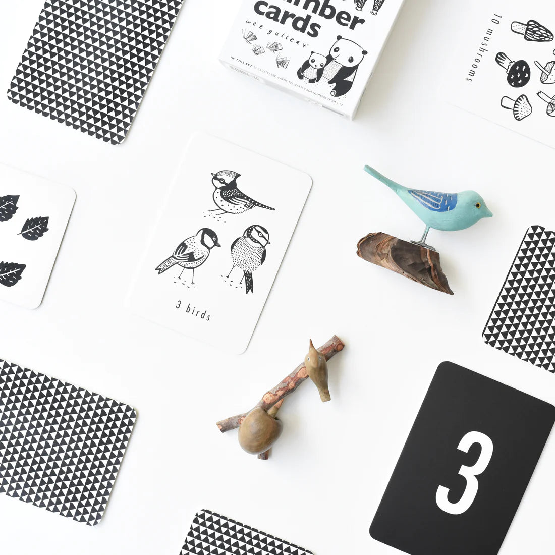 Wee Gallery Nature Number Cards laid out with small animal figurines