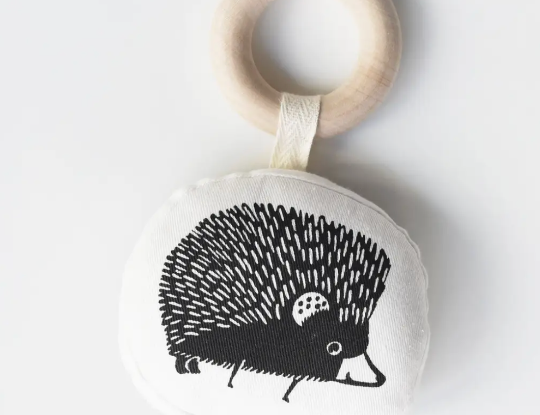 Wee Gallery Organic Teether, a hedgehog-print cotton teether on a natural wooden ring