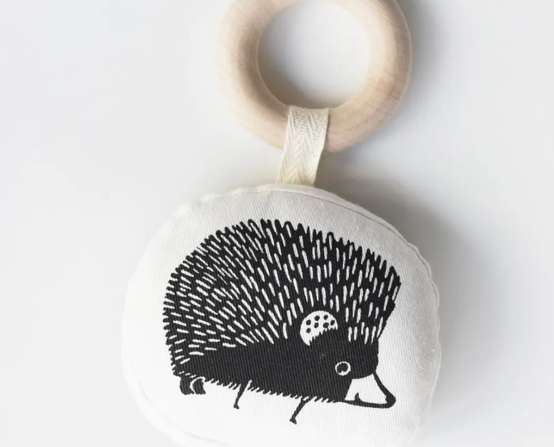 Wee Gallery Organic Teether, a hedgehog-print cotton teether on a natural wooden ring