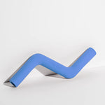 Wild One Bolt Bite Dog Toy in Moonstone blue, a zigzag rubber chew toy lying on its side