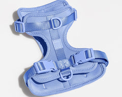 Wild One Dog Harness in Moonstone, a periwinkle blue padded adjustable harness, laid flat
