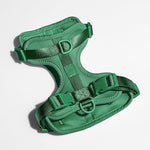 Wild One Dog Harness in Spruce green, a padded adjustable harness with matte buckles, laid flat