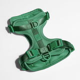 Wild One Dog Harness in Spruce green, a padded adjustable harness with matte buckles, laid flat