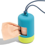 Wild One Poop Bag Carrier in Hudson Blue with a lime green base and navy strap, with a peach waste bag pulling out, on a white background