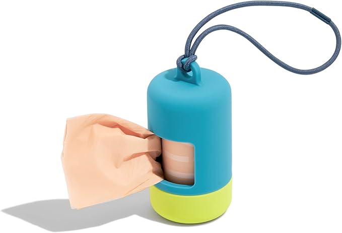 Wild One Poop Bag Carrier in Hudson Blue with a lime green base and navy strap, with a peach waste bag pulling out, on a white background
