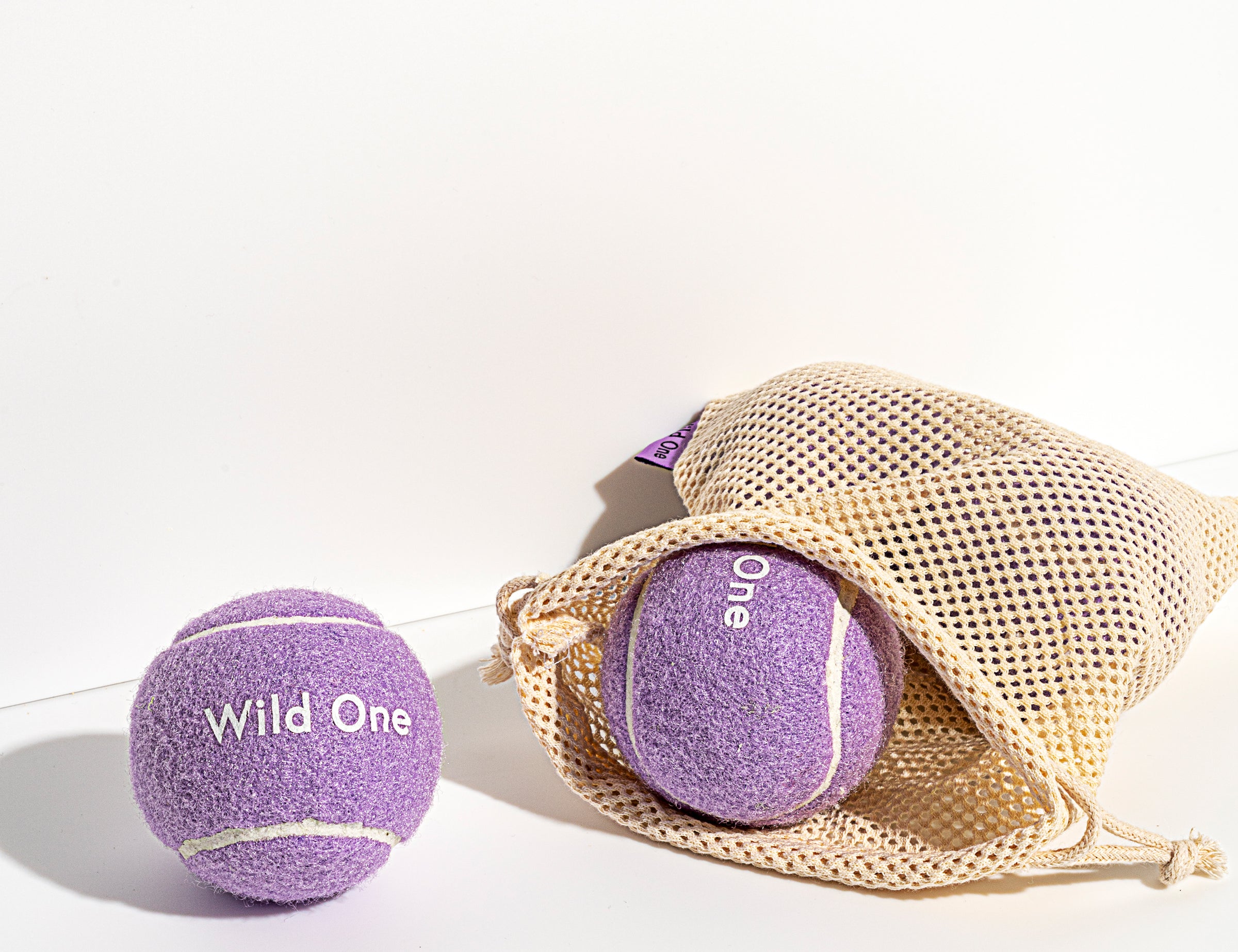Wild One Tennis Balls in Lilac with a mesh carry bag