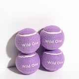 Wild One Tennis Balls in Lilac, four purple felt balls stacked with the Wild One logo