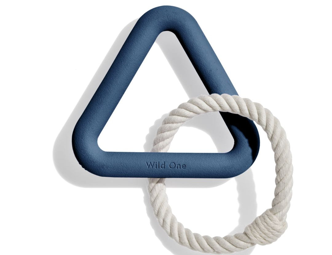 Wild One Triangle Tug Toy in Navy, a navy blue rubber triangle with a cream rope loop