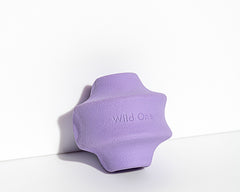 Wild One Twist Toss Dog Toy in Lilac, a purple rubber twisted treat toy